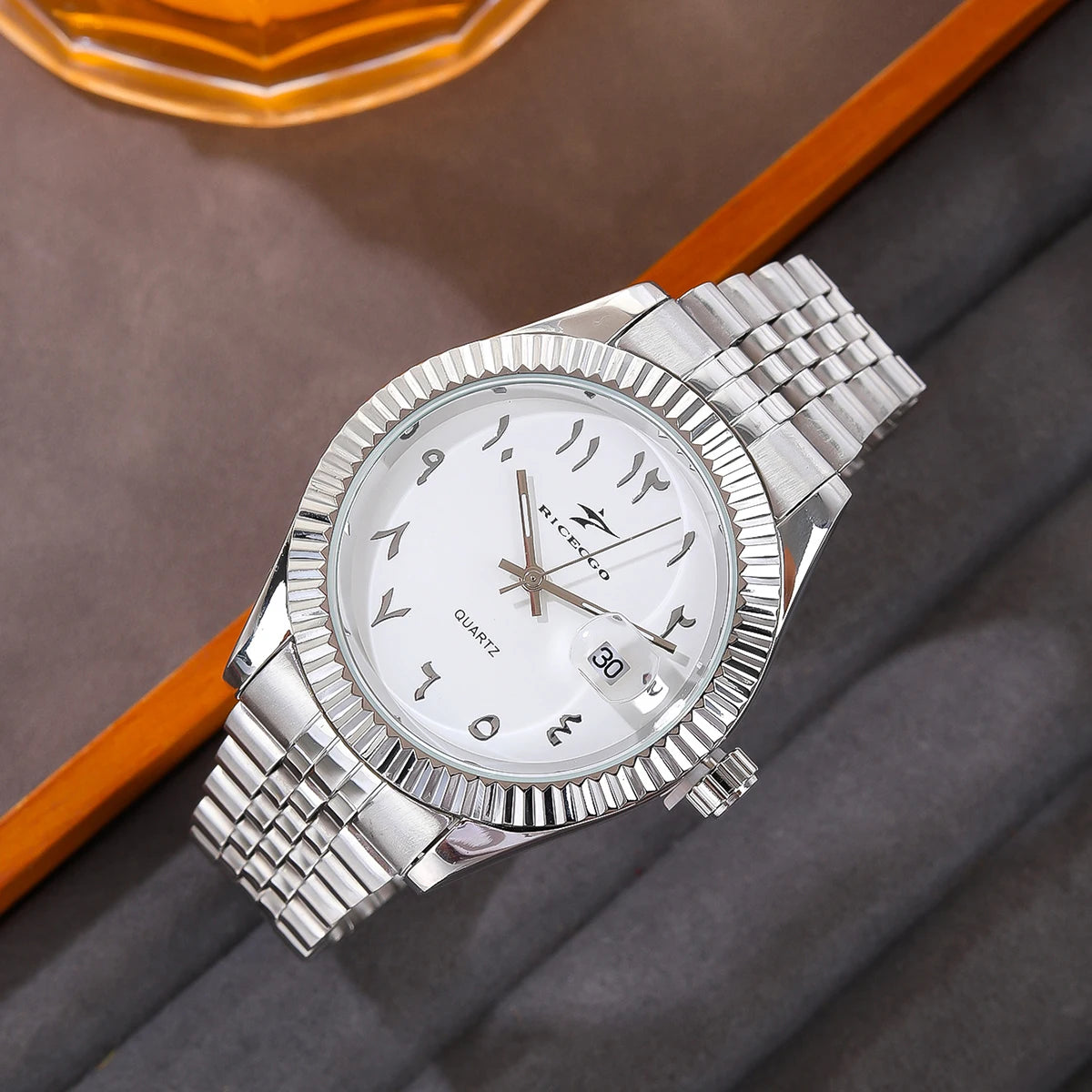 Classic steel timepiece with a textured bezel, clean dial, and reliable quartz movement.