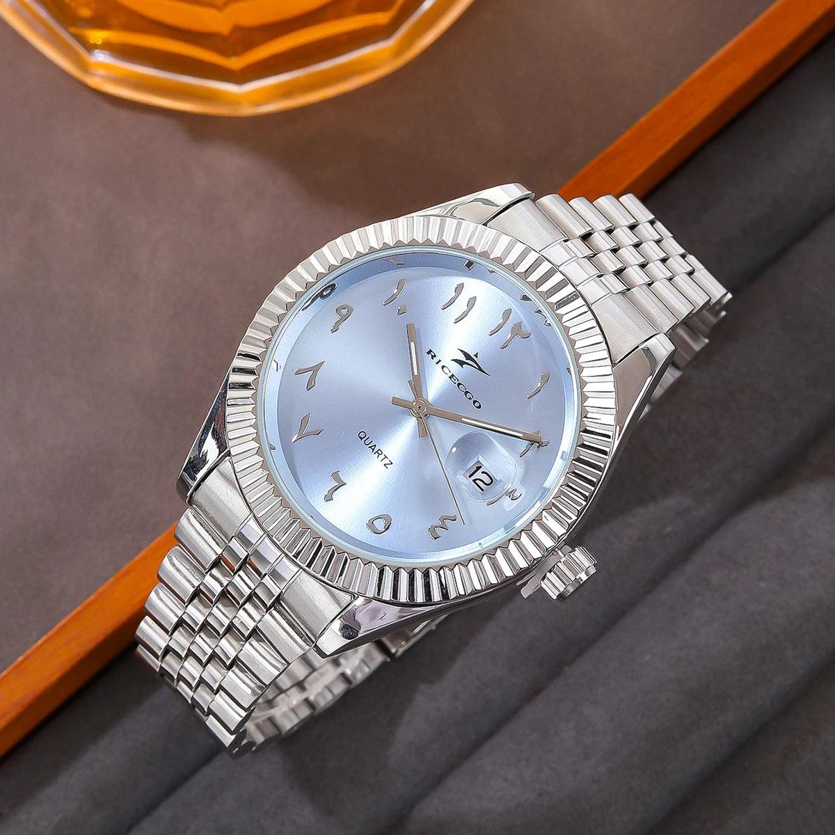 Classic steel timepiece with a textured bezel, clean dial, and reliable quartz movement.