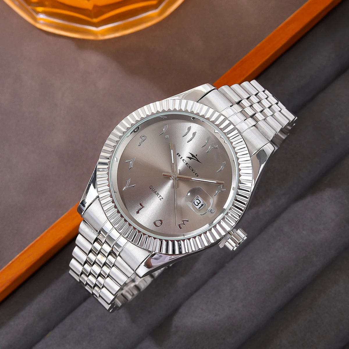 Classic steel timepiece with a textured bezel, clean dial, and reliable quartz movement.