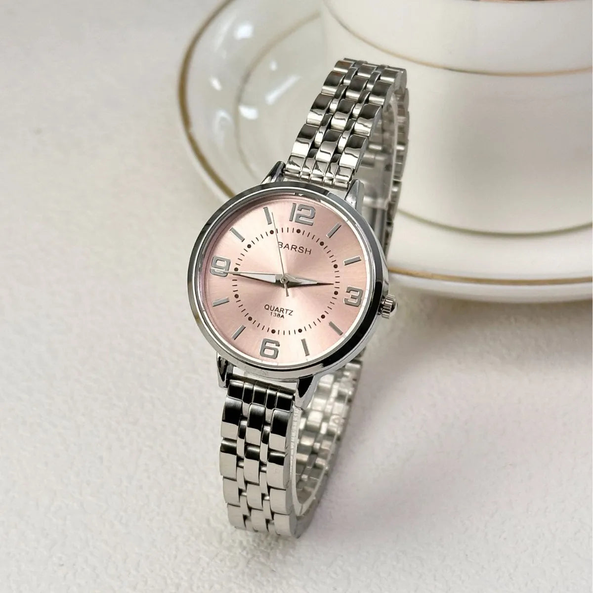 Elegant women’s silver watch with a polished stainless steel bracelet and clean white dial. Timeless, refined, and perfect for everyday luxury