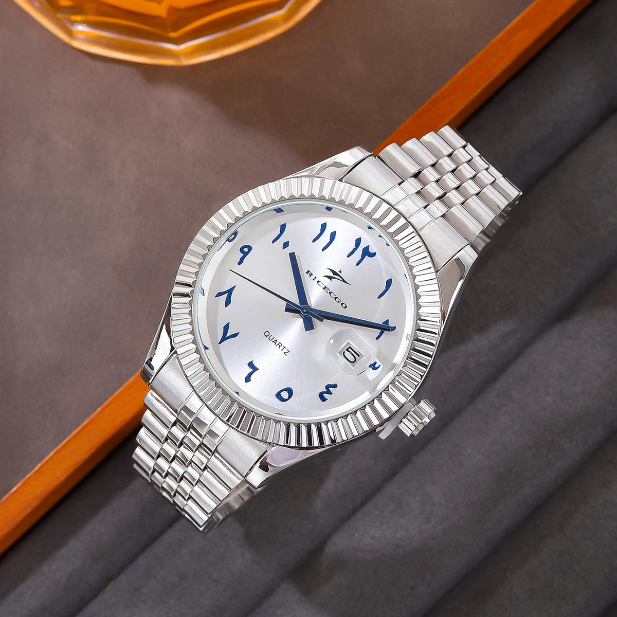 Classic steel timepiece with a textured bezel, clean dial, and reliable quartz movement.